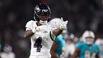 Baltimore Ravens wide receiver Zay Flowers (4) reacts after a runs for a gain during the third quarter against the Miami Dolphins at Hard Rock Stadium. 
