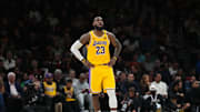 Dec 4, 2024; Miami, Florida, USA;  Los Angeles Lakers forward LeBron James (23) looks up at the scoreboard late in a game against the Miami Heat at Kaseya Center. Mandatory Credit: Jim Rassol-Imagn Images