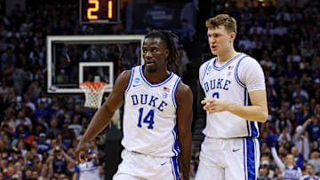 Mar 29, 2025; Newark, NJ, USA; Duke basketball guard Sion James (14) and forward Cooper Flagg (2) celebrates during the first half against the Alabama Crimson Tide in the East Regional final of the 2025 NCAA tournament at Prudential Center. 