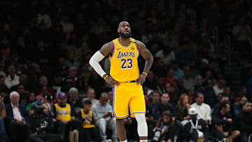 Dec 4, 2024; Miami, Florida, USA;  Los Angeles Lakers forward LeBron James (23) looks up at the scoreboard late in a game against the Miami Heat at Kaseya Center. Mandatory Credit: Jim Rassol-Imagn Images