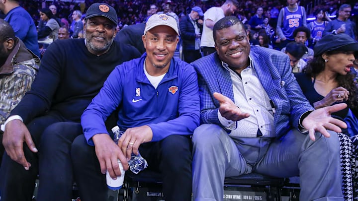 Apr 20, 2024; New York, New York, USA; Former NBA players Larry Johnson (l), Johns Starks (c) and Bernard King (r) watch game one of the first round for the 2024 NBA playoffs between the Philadelphia 76ers and New York Knicks at Madison Square Garden. Mandatory Credit: Wendell Cruz-Imagn Images