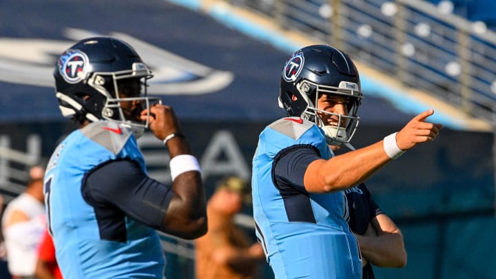 Aug 10, 2024; Nashville, Tennessee, USA;  Tennessee Titans quarterback Mason Rudolph (11) and quarterback Malik Willis (7) laugh  during pregame warmups at Nissan Stadium. Mandatory Credit: Steve Roberts-USA TODAY Sports