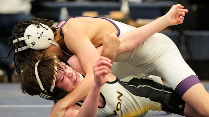 Traevon Ducking (top) was one of three Brownsburg (Ind.) wrestlers to win a title last week at the IndianaMat Hoosier Preseason Open.