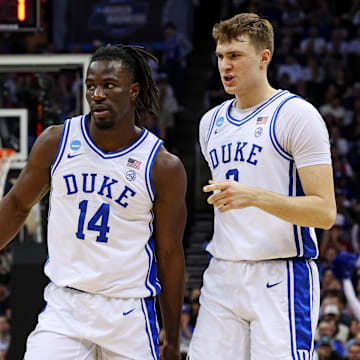 Duke basketball guard Sion James and forward Cooper Flagg