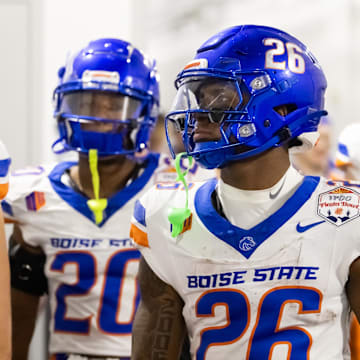 Dec 31, 2024; Glendale, AZ, USA; Boise State Broncos running back Sire Gaines (26) against the Penn State Nittany Lions during the Fiesta Bowl at State Farm Stadium. Mandatory Credit: Mark J. Rebilas-Imagn Images