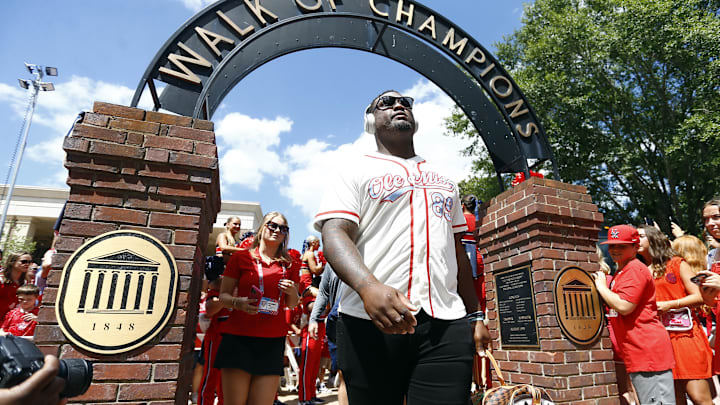 Sep 7, 2024; Oxford, Mississippi, USA; Mississippi Rebels defensive lineman JJ Pegues (38) makes his makes his way down the Walk of Champions prior to the game against the Middle Tennessee Blue Raiders at Vaught-Hemingway Stadium. Mandatory Credit: Petre Thomas-Imagn Images