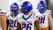 Dec 31, 2024; Glendale, AZ, USA; Boise State Broncos running back Sire Gaines (26) against the Penn State Nittany Lions during the Fiesta Bowl at State Farm Stadium. Mandatory Credit: Mark J. Rebilas-Imagn Images