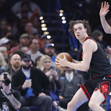 Mar 31, 2025; Oklahoma City, Oklahoma, USA; Oklahoma City Thunder forward Chet Holmgren (7) defends Chicago Bulls guard Josh Giddey (3) during the second quarter at Paycom Center. Mandatory Credit: Alonzo Adams-Imagn Images