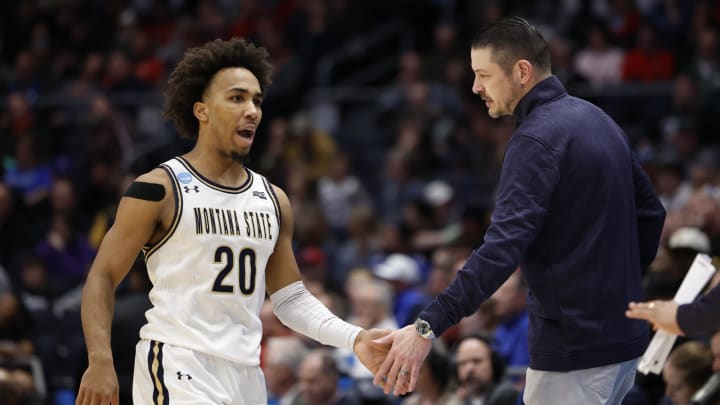 Mar 20, 2024; Dayton, OH, USA; Montana State Bobcats guard Robert Ford III (20) high-fives Montana State Bobcats head coach Matt Logie at UD Arena. Mandatory Credit: Rick Osentoski-USA TODAY Sports