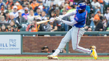 Jul 27, 2025; San Francisco, California, USA; New York Mets third baseman Ronny Mauricio (10) hits a solo home run during the seventh inning San Francisco Giants at Oracle Park. Mandatory Credit: Bob Kupbens-Imagn Images
