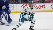 Mar 3, 2025; Toronto, Ontario, CAN; San Jose Sharks forward Fabian Zetterlund (20) skates against the Toronto Maple Leafs during the second period at Scotiabank Arena. Mandatory Credit: John E. Sokolowski-Imagn Images
