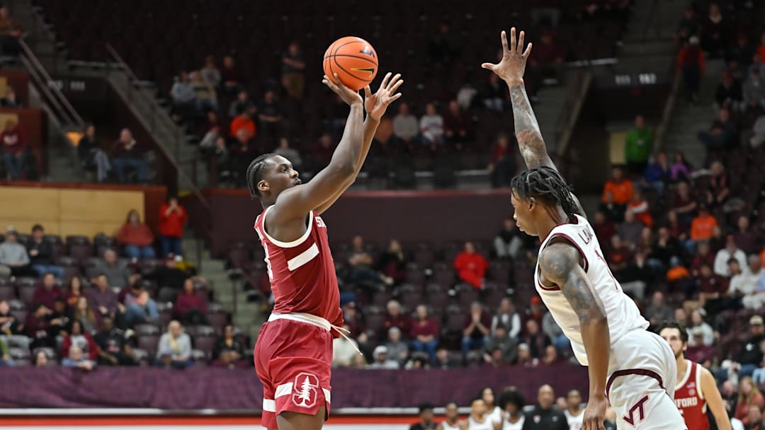 Jan 7, 2026; Blacksburg, Va.; Stanford forward Chisom Okpara (10) shoots a shot over Virginia Tech forward Tobi Lawal (1).