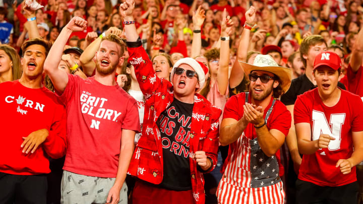 Oct 1, 2022; Lincoln, Nebraska, USA; Nebraska Cornhuskers fans cheer during a break between quarters against the Indiana Hoosiers at Memorial Stadium.