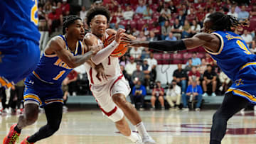 Nov 11, 2024; Tuscaloosa, AL, USA; Alabama guard Mark Sears (1) splits between McNeese guard Omar Cooper (1) and McNeese forward Bryan Selebangue (9) at Coleman Coliseum. Mandatory Credit: Gary Cosby Jr.-Tuscaloosa News