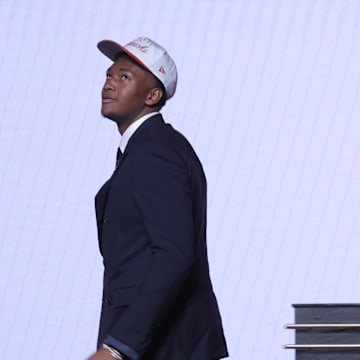 Derik Queen reacts on stage after being selected as the No. 13 pick by the Atlanta Hawks