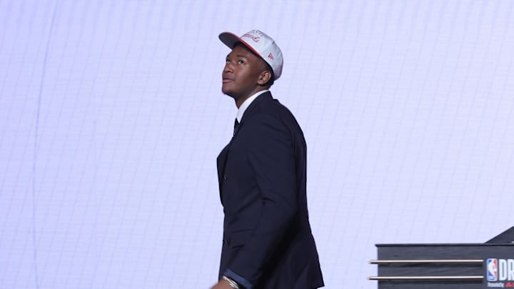 Derik Queen reacts on stage after being selected as the No. 13 pick by the Atlanta Hawks