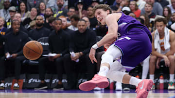 Nov 13, 2025; Salt Lake City, Utah, USA; Utah Jazz forward Lauri Markkanen (23) saves the ball from going out of bounds against the Atlanta Hawks during the first half at Delta Center. Mandatory Credit: Rob Gray-Imagn Images