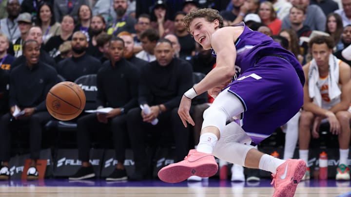 Nov 13, 2025; Salt Lake City, Utah, USA; Utah Jazz forward Lauri Markkanen (23) saves the ball from going out of bounds against the Atlanta Hawks during the first half at Delta Center. Mandatory Credit: Rob Gray-Imagn Images