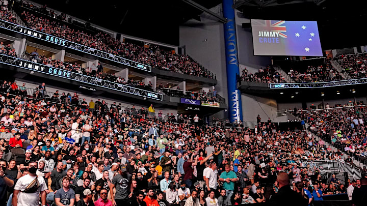 Fans feel the seats of VyStar Veterans Memorial Arena before Anthony Smith fights Jimmy Crute during UFC 261. Fans feel the seats of VyStar Veterans Memorial Arena before Anthony Smith fights Jimmy Crute during UFC 261.