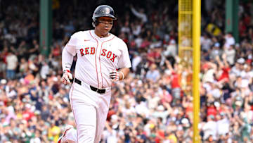 Jun 15, 2025; Boston, Massachusetts, USA; Boston Red Sox designated hitter Rafael Devers (11) runs the bases after hitting a one run home run against the New York Yankees during the fifth inning at Fenway Park. Mandatory Credit: Eric Canha-Imagn Images