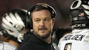 Nov 16, 2024; Madison, Wisconsin, USA;  Oregon Ducks head coach Dan Lanning looks on during the third quarter against the Wisconsin Badgers at Camp Randall Stadium.