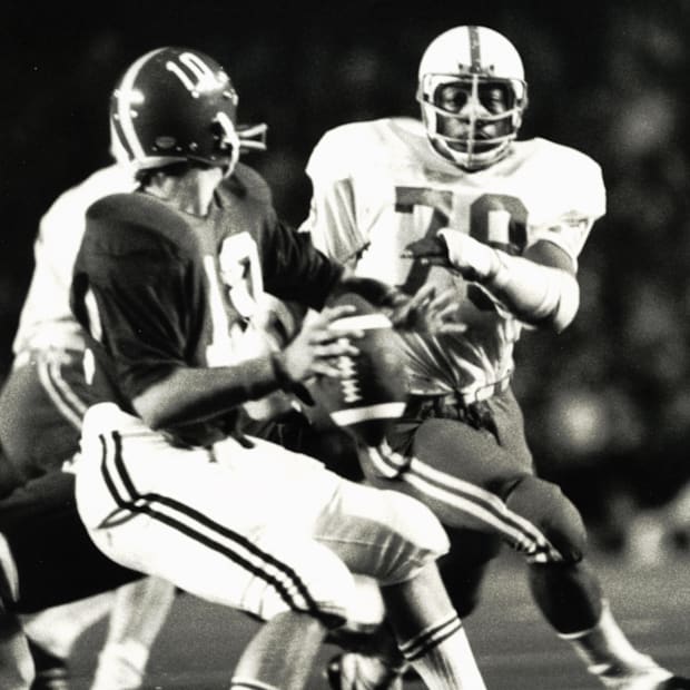 Nebraska's Rich Glover pressures Alabama quarterback Terry Davis during the 1972 Orange Bowl.
