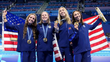 Aug 4, 2024; Nanterre, France; Regan Smith (USA) Lilly King (USA), Gretchen Walsh (USA) and Torri Huske (USA) in the women’s 4 x 100-meter medley relay medal ceremony during the Paris 2024 Olympic Summer Games at Paris La Défense Arena. Mandatory Credit: Rob Schumacher-USA TODAY Sports