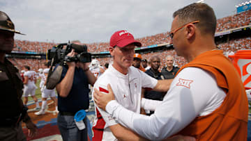 Oklahoma Sooners head coach Brent Venables, left, and Texas Longhorns head coach Steve Sarkisian meet after the Red River Showdown college football game between the University of Oklahoma (OU) and Texas at the Cotton Bowl in Dallas, Saturday, Oct. 8, 2022.  Texas won 49-0.

Lx18920