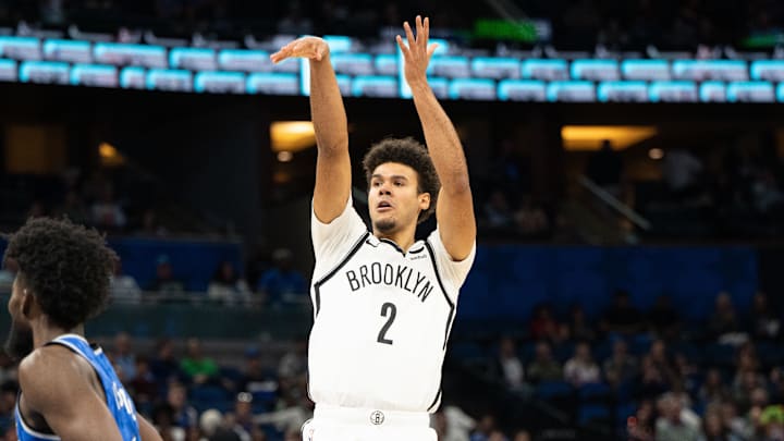 Mar 13, 2024; Orlando, Florida, USA; Brooklyn Nets forward Cameron Johnson (2) shoots the ball against the Orlando Magic in the second quarter at Kia Center. Mandatory Credit: Jeremy Reper-Imagn Images