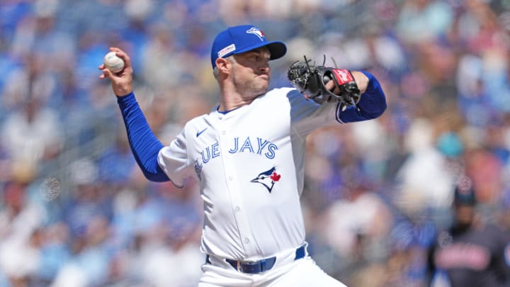 Jun 15, 2024; Toronto, Ontario, CAN; Toronto Blue Jays starting pitcher Trevor Richards (33) throws a pitch against the Cleveland Guardians during the first inning at Rogers Centre. Mandatory Credit: Nick Turchiaro-USA TODAY Sports