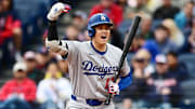 May 28, 2025; Cleveland, Ohio, USA; Los Angeles Dodgers designated hitter Shohei Ohtani (17) motions for Los Angeles Dodgers first baseman Kike Hernandez (not pictured) to come home on a wild pitch during the seventh inning against the Cleveland Guardians at Progressive Field.