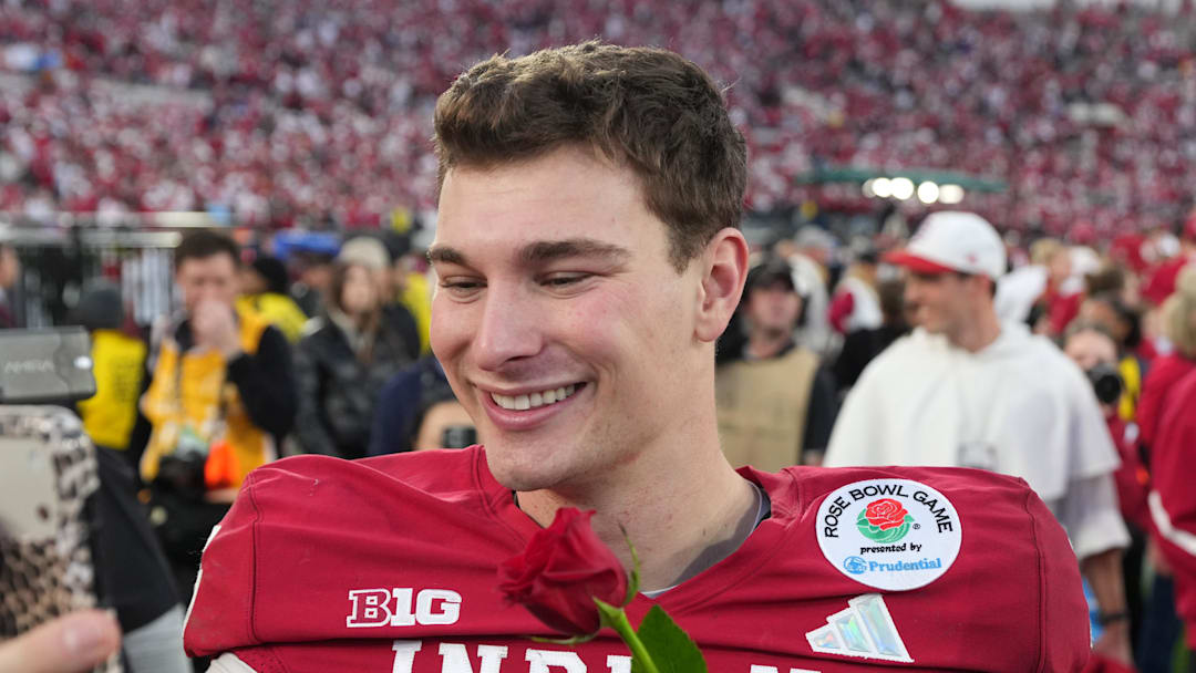 Jan 1, 2026; Pasadena, CA, USA; Indiana Hoosiers quarterback Fernando Mendoza (15) reacts after the 2025 Rose Bowl and quarterfinal game of the College Football Playoff against the Alabama Crimson Tide at Rose Bowl Stadium. Mandatory Credit: Kirby Lee-Imagn Images