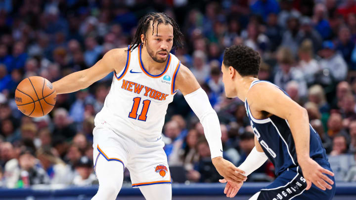 Jan 11, 2024; Dallas, Texas, USA;  New York Knicks guard Jalen Brunson (11) dribbles as Dallas Mavericks guard Josh Green (8) defends during the first half at American Airlines Center. Mandatory Credit: Kevin Jairaj-USA TODAY Sports