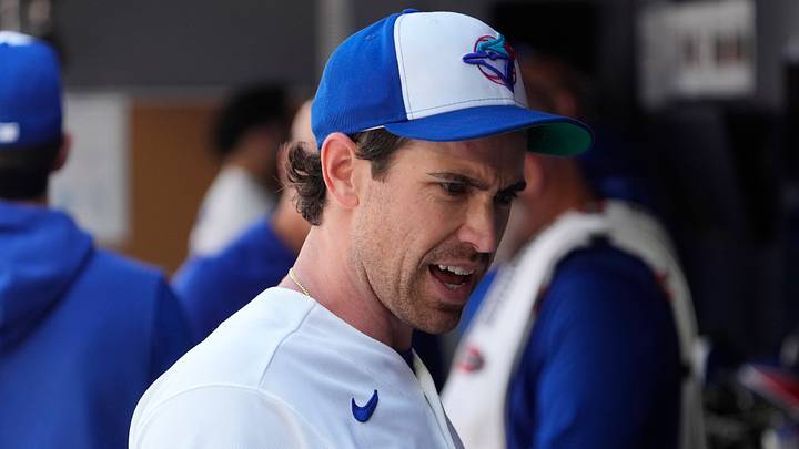 Toronto, Ontario, CAN; Toronto Blue Jays starting pitcher Shane Bieber (57) in the dug out during the second inning against the Tampa Bay Rays at Rogers Centre. Mandatory Credit: John E. Sokolowski-Imagn Images