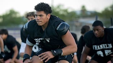 Franklin’s Justin Morales works on drills with his teammates at football practice on Wednesday morning, Aug. 14, 2024.