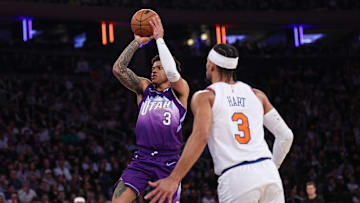 Jan 1, 2025; New York, New York, USA; Utah Jazz guard Keyonte George (3) shoots the ball in front of New York Knicks guard Josh Hart (3) during the first half at Madison Square Garden. Mandatory Credit: Vincent Carchietta-Imagn Images