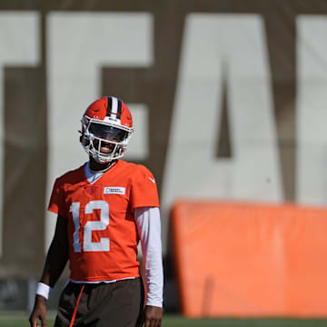 Cleveland Browns quarterback Shedeur Sanders (12) jokes around during NFL training camp practice at the Cleveland Browns training facility, Wednesday, July 23, 2025, in Berea, Ohio.