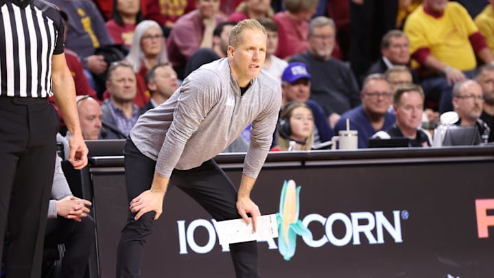 Mar 4, 2025; Ames, Iowa, USA; Brigham Young Cougars head coach Kevin Young watches his team play the Iowa State Cyclones during the second half at James H. Hilton Coliseum. Mandatory Credit: Reese Strickland-Imagn Images