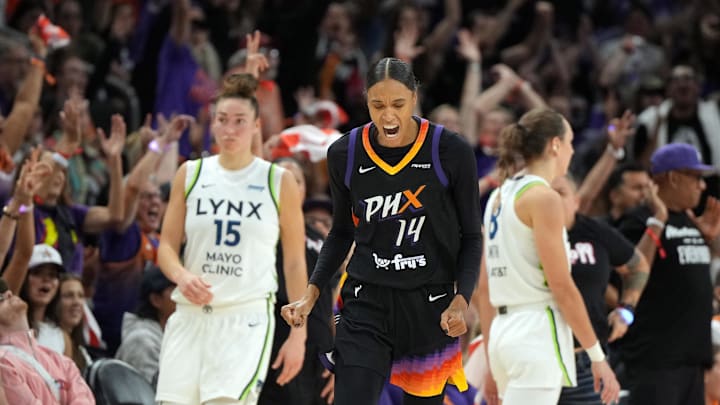 Sep 28, 2025; Phoenix, Arizona, USA; Phoenix Mercury forward DeWanna Bonner (14) reacts after scoring against the Minnesota Lynx in the second half during game four of the second round for the 2025 WNBA Playoffs at PHX Arena. Mandatory Credit: Rick Scuteri-Imagn Images