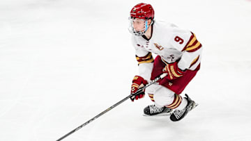 Apr 11, 2024; Saint Paul, Minnesota, USA; Boston College Eagles forward Ryan Leonard (9) carries the puck in the semifinals of the 2024 Frozen Four college ice hockey tournament during the third period against the Michigan Wolverines at Xcel Energy Center. Mandatory Credit: Brace Hemmelgarn-Imagn Images