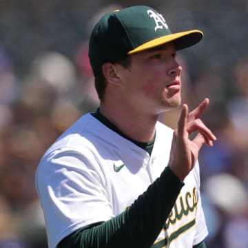 Jun 9, 2024; Oakland, California, USA; Oakland Athletics relief pitcher Mason Miller (19) gestures after the end of the top if the ninth inning against the Toronto Blue Jays at Oakland-Alameda County Coliseum. Mandatory Credit: Darren Yamashita-USA TODAY Sports
