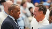 Nov 7, 2025; Chapel Hill, North Carolina, USA; North Carolina Tar Heels head coach Hubert Davis with Kansas Jayhawks head coach Bill Self before the game at Dean E. Smith Center. 