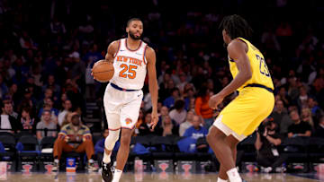 Oct 25, 2024; New York, New York, USA; New York Knicks forward Mikal Bridges (25) brings the ball up court against Indiana Pacers forward Aaron Nesmith (23) during the third quarter at Madison Square Garden. Mandatory Credit: Brad Penner-Imagn Images