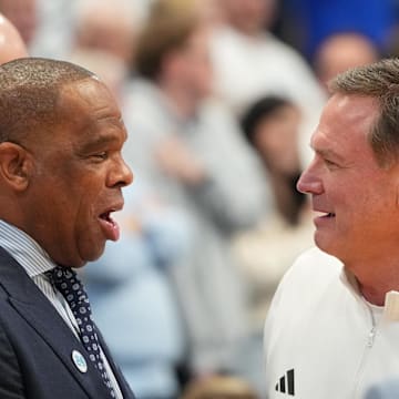 Nov 7, 2025; Chapel Hill, North Carolina, USA; North Carolina Tar Heels head coach Hubert Davis with Kansas Jayhawks head coach Bill Self before the game at Dean E. Smith Center. 