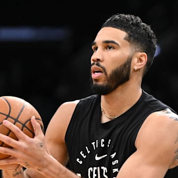 Mar 8, 2025; Boston, Massachusetts, USA; Boston Celtics forward Jayson Tatum (0) takes a shot during warmups before a game against the Los Angeles Lakers at the TD Garden. Mandatory Credit: Brian Fluharty-Imagn Images