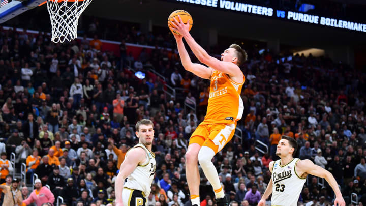 Tennessee guard Dalton Knecht (3) scores on the transition in the second half of the NCAA Tournament Elite Eight college basketball game against Purdue at Little Caesars Arena in Detroit, MI on Sunday, March 31, 2024.