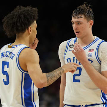 Duke basketball guard Tyrese Proctor and forward Cooper Flagg