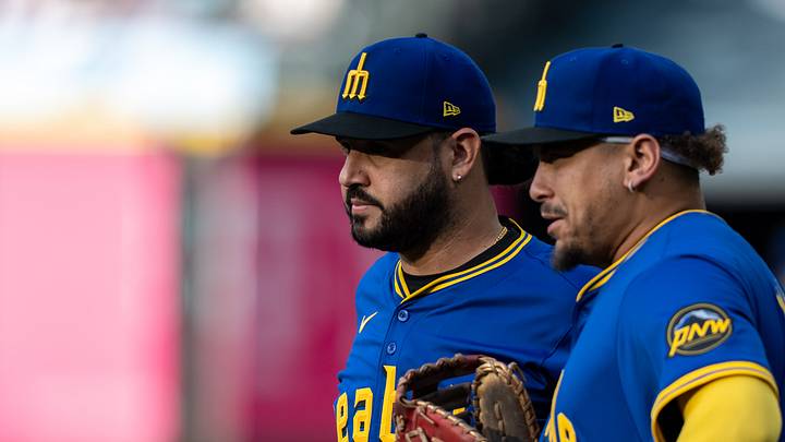 Seattle Mariners infielders Eugenio Suarez, Josh Naylor
