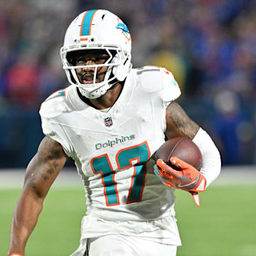 Sep 18, 2025; Orchard Park, New York, USA; Miami Dolphins wide receiver Jaylen Waddle (17) runs against the Buffalo Bills in the fourth quarter at Highmark Stadium. Mandatory Credit: Mark Konezny-Imagn Images