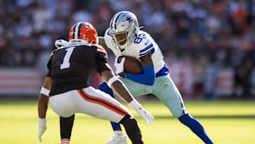 Sep 8, 2024; Cleveland, Ohio, USA; Dallas Cowboys wide receiver Jalen Brooks (83) runs the ball against Cleveland Browns safety Juan Thornhill (1) during the second quarter at Huntington Bank Field. Mandatory Credit: Scott Galvin-Imagn Images